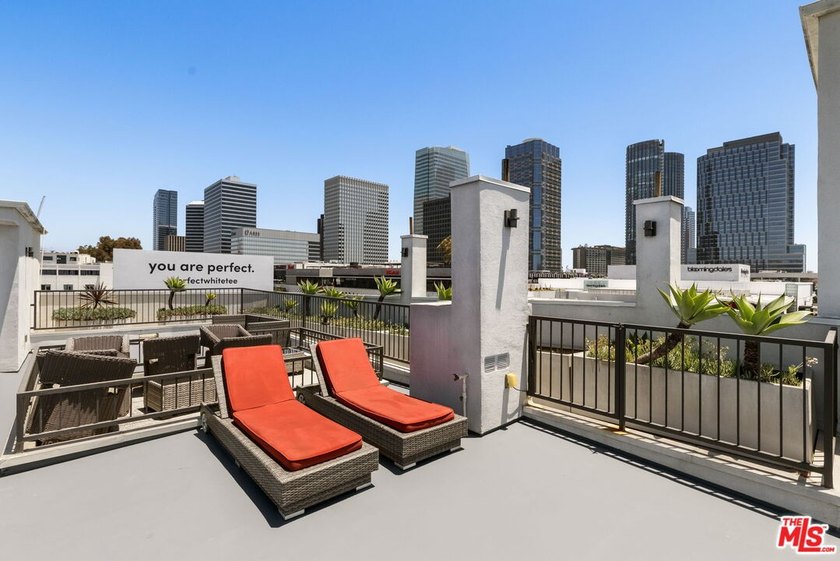 Stunning newer contemporary condo right across the street from - photo 25
