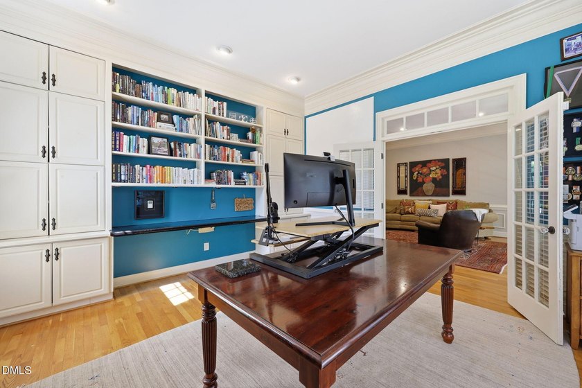 Quietly tucked away in North Ridge, this custom estate captures - photo 30