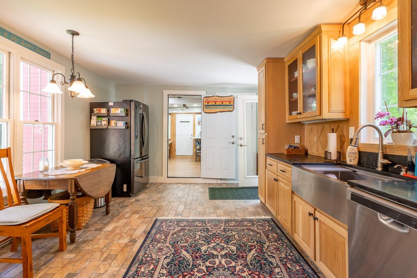 Tastefully renovated and meticulously maintained, this three - photo 4