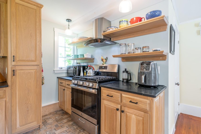 Tastefully renovated and meticulously maintained, this three - photo 8