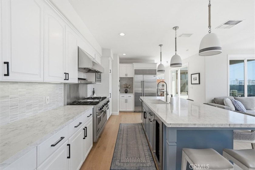LOCATED JUST FOUR HOUSES FROM THE STRAND, this beautifully - photo 16