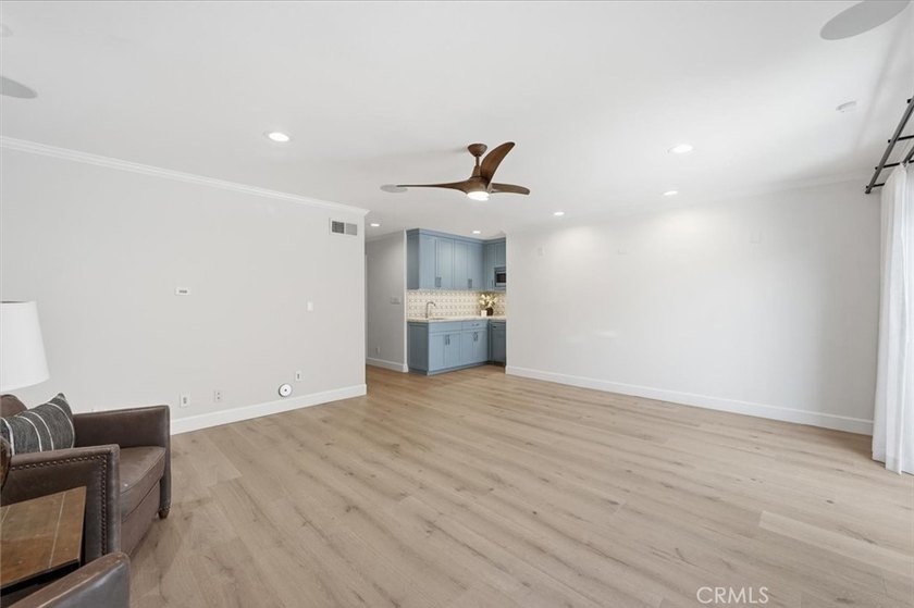 LOCATED JUST FOUR HOUSES FROM THE STRAND, this beautifully - photo 48