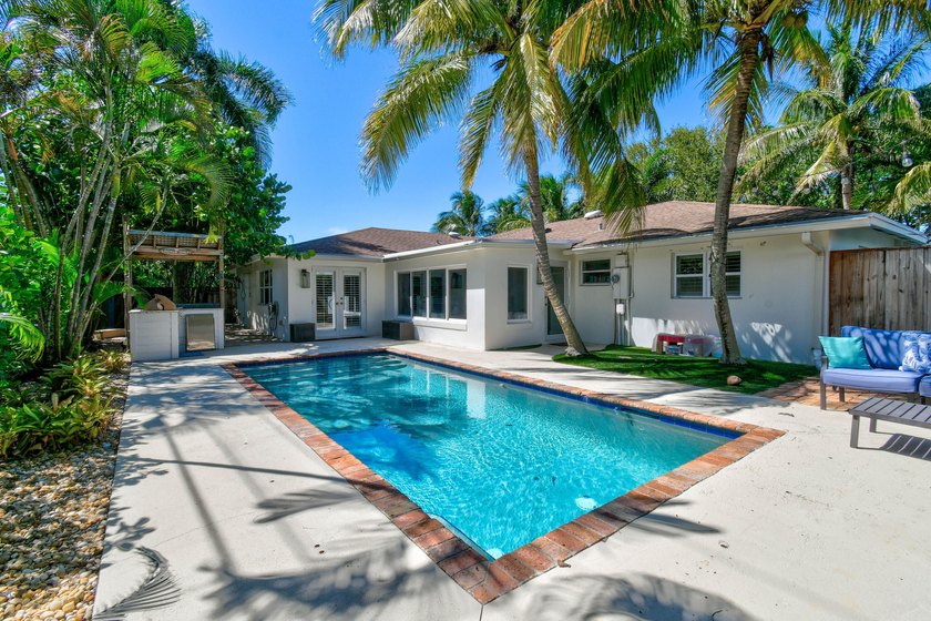 Located in one of the more desirable areas in all of North Palm - photo 2