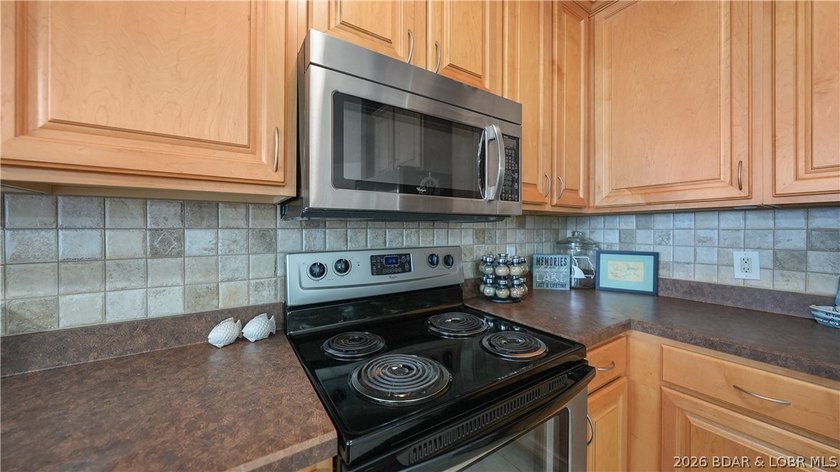 Right in the heart of Osage Beach, this Lands' End condo puts - photo 13