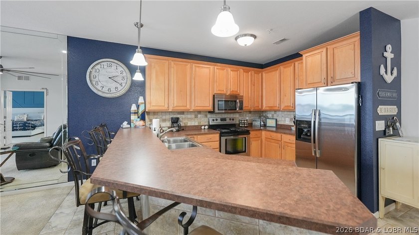 Right in the heart of Osage Beach, this Lands' End condo puts - photo 16