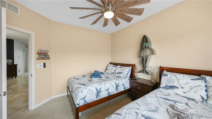 Right in the heart of Osage Beach, this Lands' End condo puts - photo 28