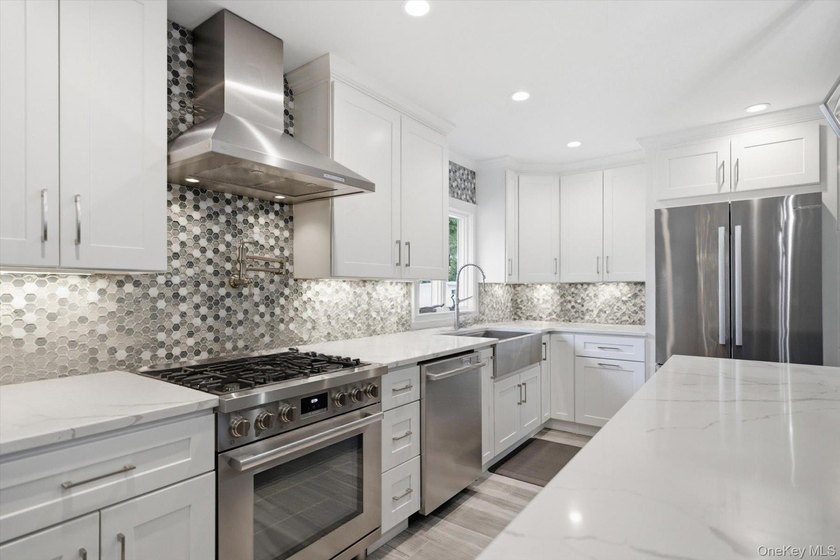 Welcome to this MINT Cape Cod-style home nestled in the heart of - photo 11