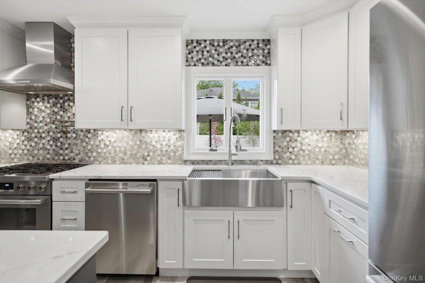 Welcome to this MINT Cape Cod-style home nestled in the heart of - photo 13