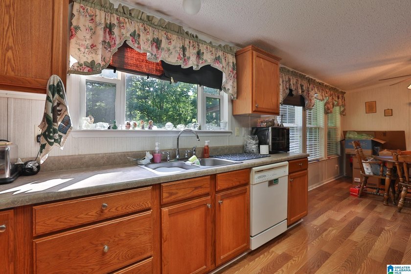 TUCKED away with privacy, this home sits on 3 acres with room to - photo 13