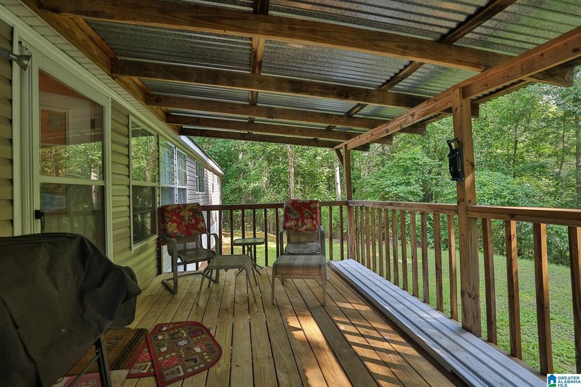 TUCKED away with privacy, this home sits on 3 acres with room to - photo 41