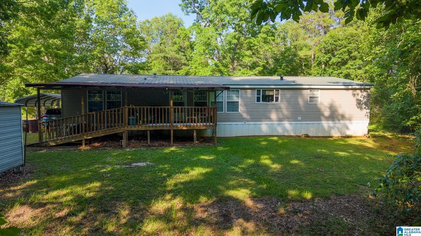 TUCKED away with privacy, this home sits on 3 acres with room to - photo 48