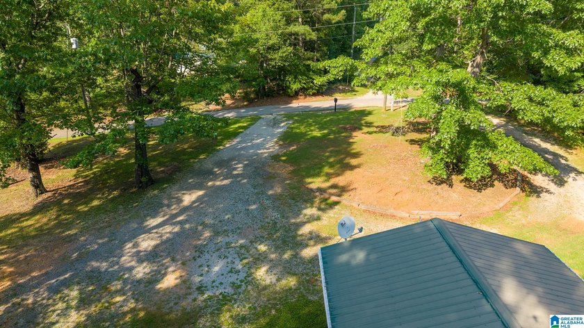 TUCKED away with privacy, this home sits on 3 acres with room to - photo 49