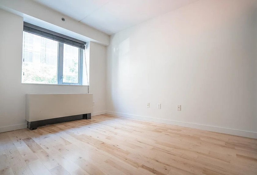 Welcome to Residence B2B, a three-bedroom, one-bath condominium - photo 8