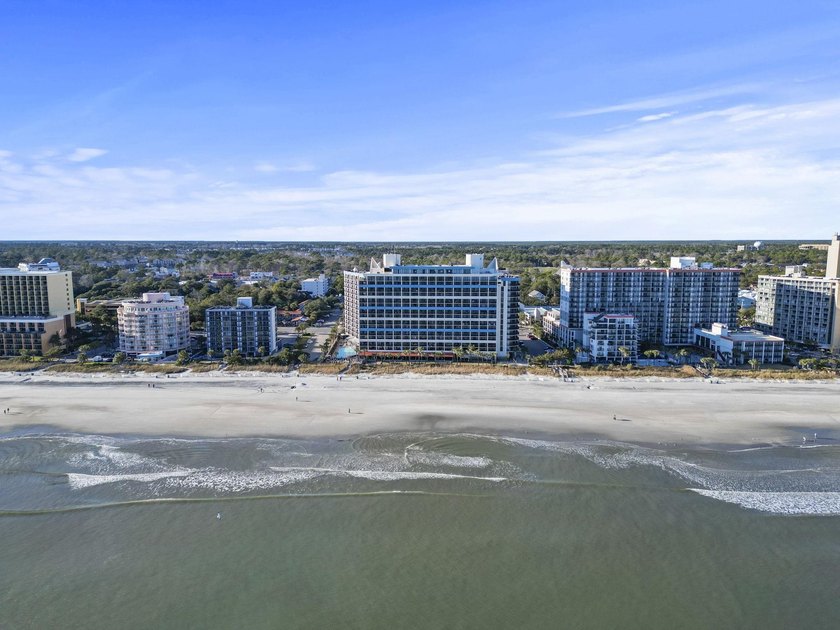 Experience the perfect beachside getaway with this charming - photo 33