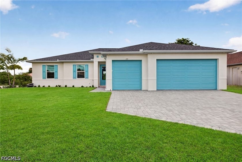 HOME IS COMPLETED!!! Long canal views, dual primary suites, a - photo 11