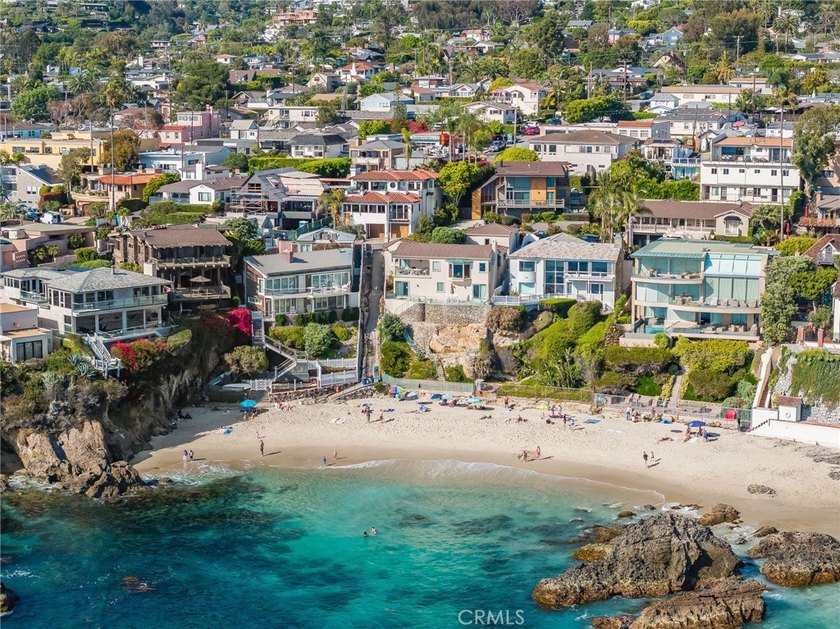 Perched above the steps to the famed Woods Cove beach, in a town - photo 4