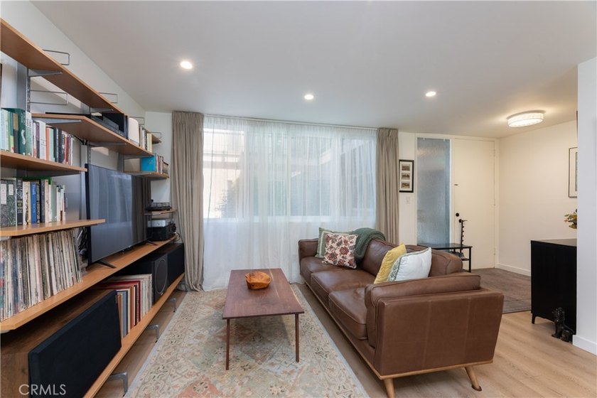 Welcome to this beautifully remodeled condominium in the highly - photo 12