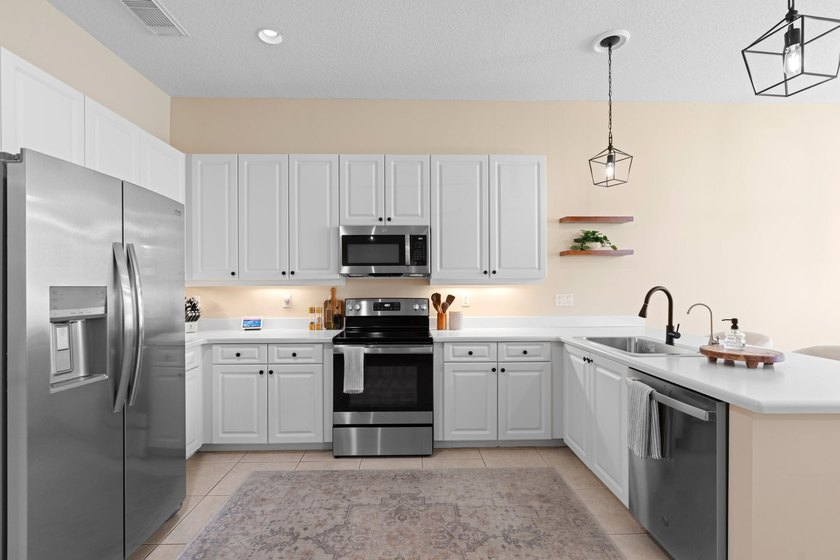 Welcome to this charming 3-bedroom, 2-bath home in the highly - photo 14