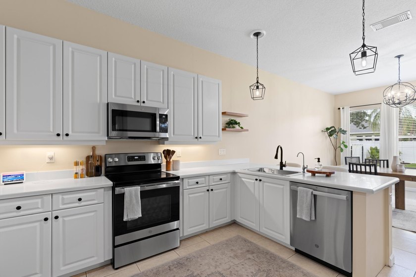 Welcome to this charming 3-bedroom, 2-bath home in the highly - photo 15
