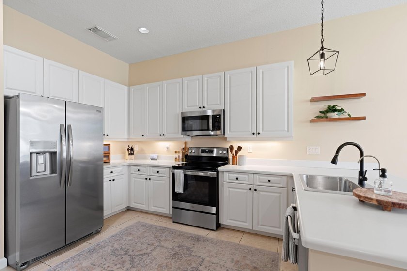 Welcome to this charming 3-bedroom, 2-bath home in the highly - photo 17