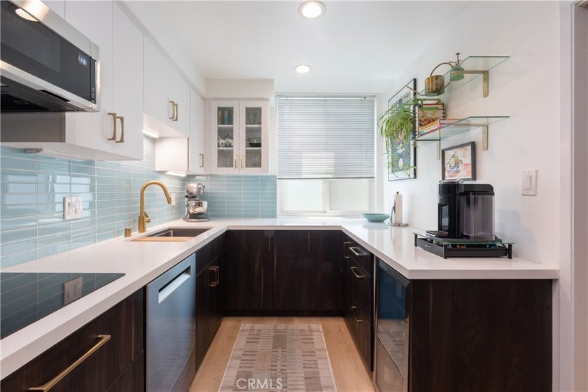 Welcome to this beautifully remodeled condominium in the highly - photo 19