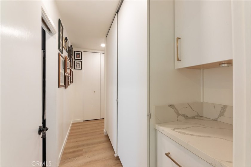 Welcome to this beautifully remodeled condominium in the highly - photo 22
