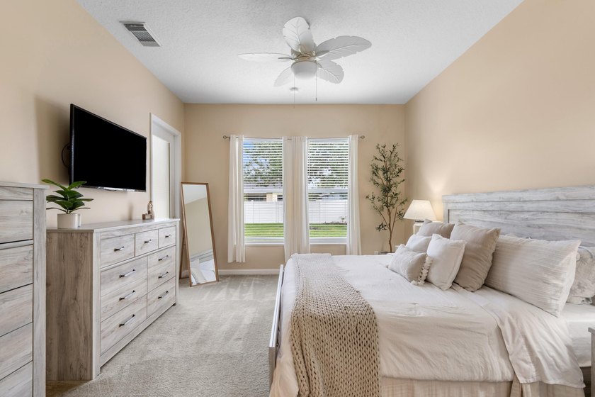 Welcome to this charming 3-bedroom, 2-bath home in the highly - photo 25