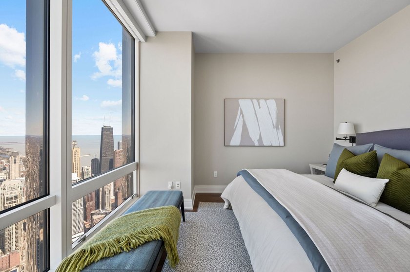 Perched 1,000 feet above the city skyline on the 79th floor is - photo 20