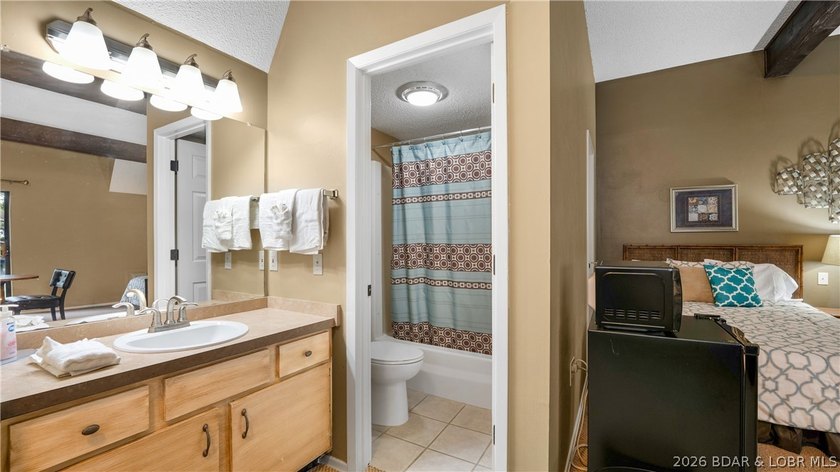 Located in the sought-after golf cart community of Tan Tar A - photo 23