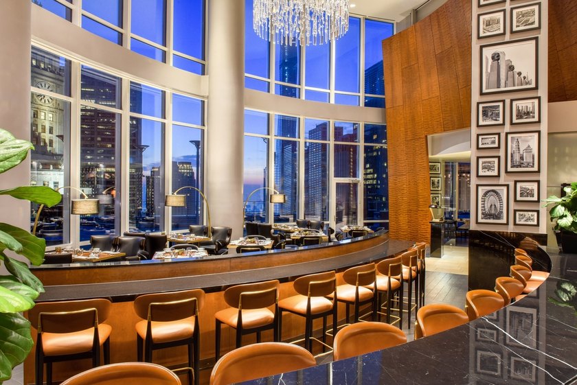 Perched 1,000 feet above the city skyline on the 79th floor is - photo 39