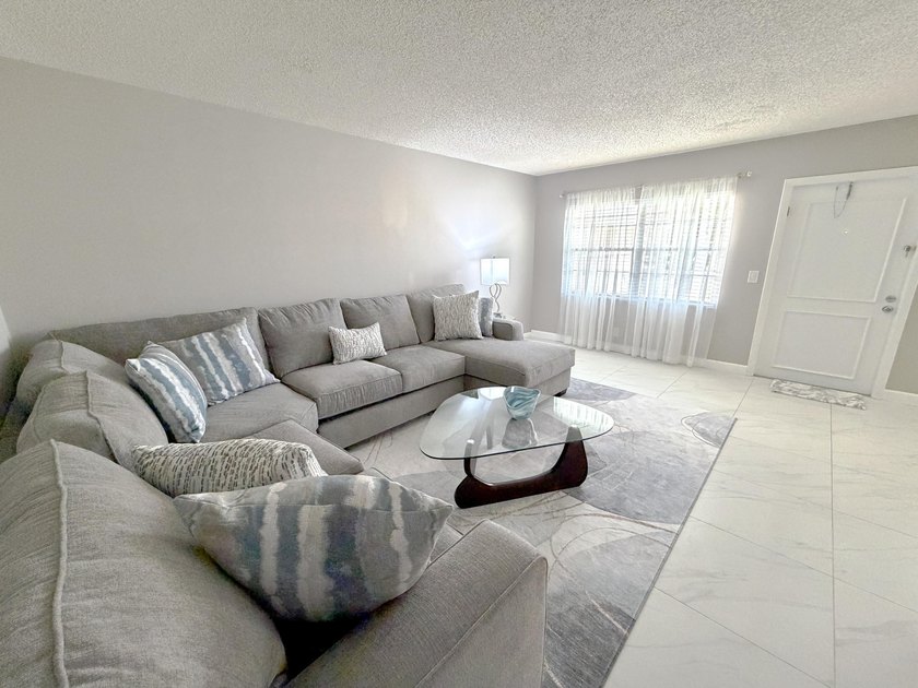 Tastefully updated condo located in a desirable 55+ gated - photo 11
