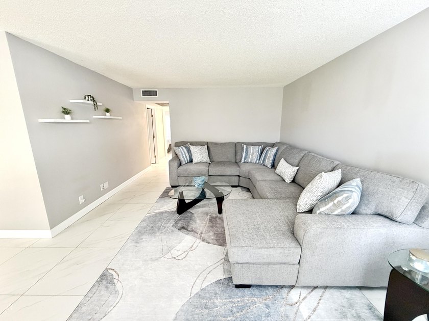 Tastefully updated condo located in a desirable 55+ gated - photo 13