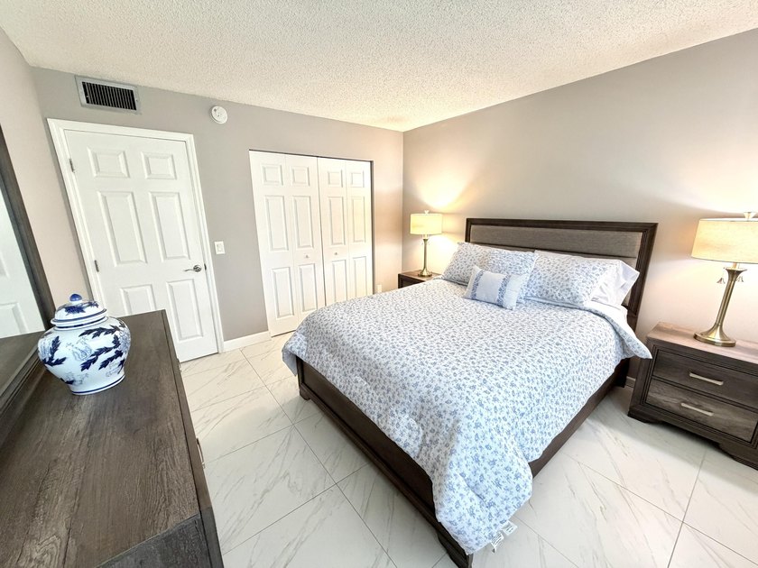 Tastefully updated condo located in a desirable 55+ gated - photo 16