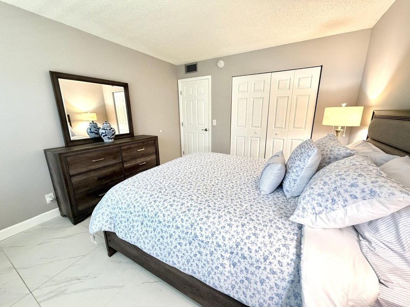 Tastefully updated condo located in a desirable 55+ gated - photo 17