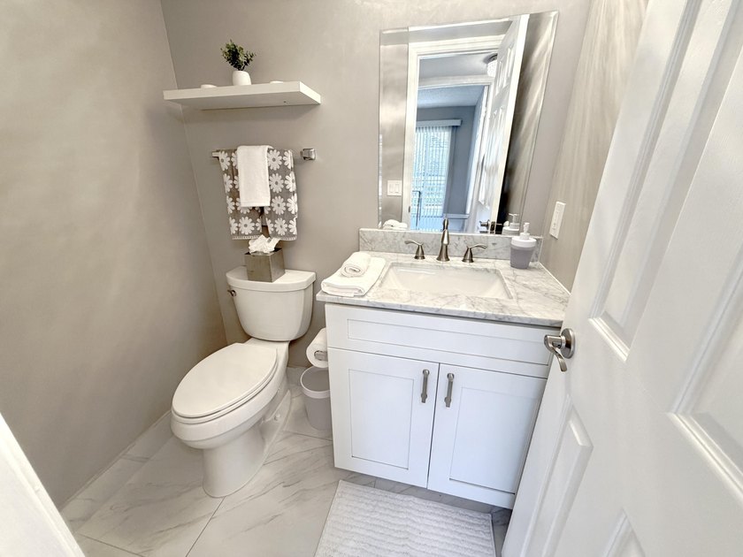 Tastefully updated condo located in a desirable 55+ gated - photo 18