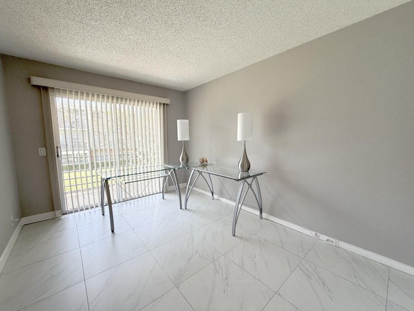 Tastefully updated condo located in a desirable 55+ gated - photo 19
