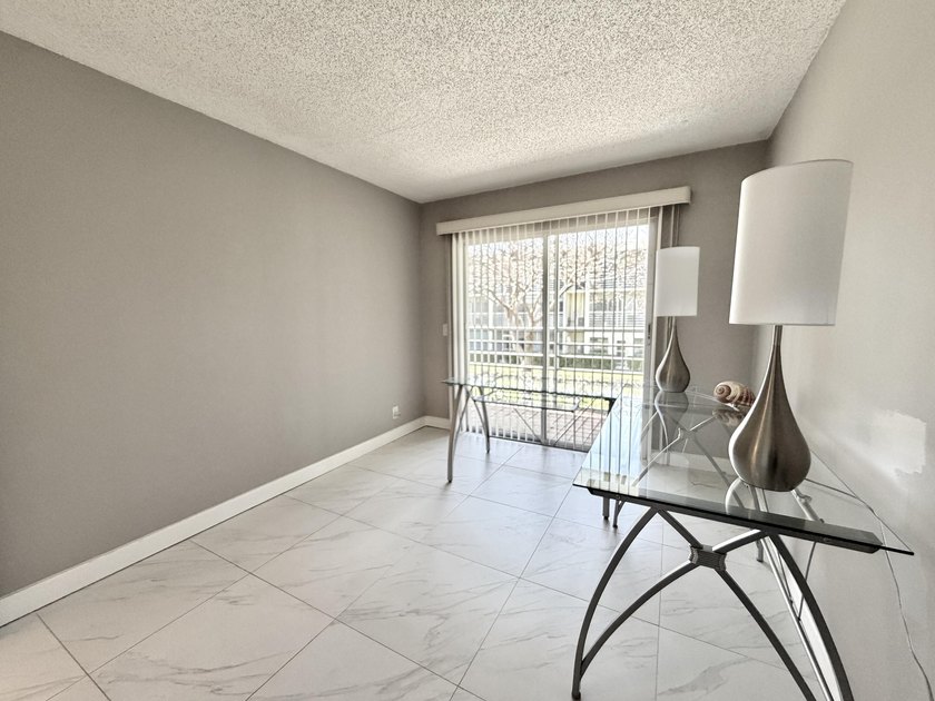Tastefully updated condo located in a desirable 55+ gated - photo 20