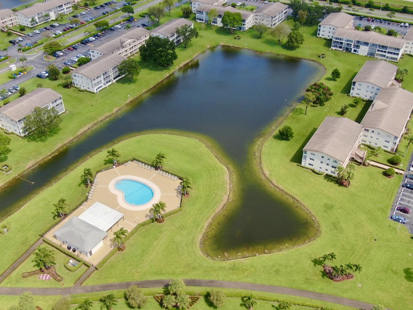 Tastefully updated condo located in a desirable 55+ gated - photo 33