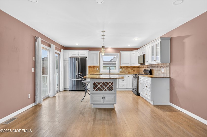 WELCOME TO THIS STUNNING CONTENPORARY HOME LOCATED IN THE HIGHLY - photo 18
