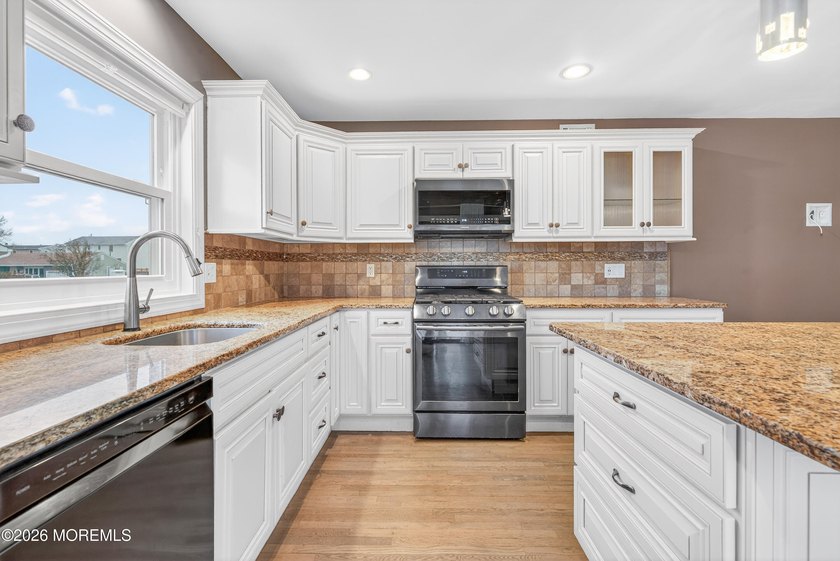 WELCOME TO THIS STUNNING CONTENPORARY HOME LOCATED IN THE HIGHLY - photo 22