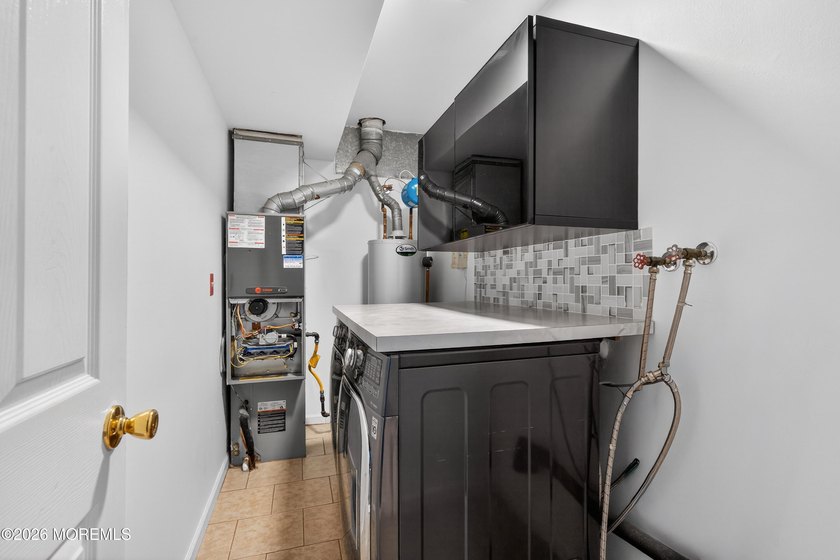 WELCOME TO THIS STUNNING CONTENPORARY HOME LOCATED IN THE HIGHLY - photo 24