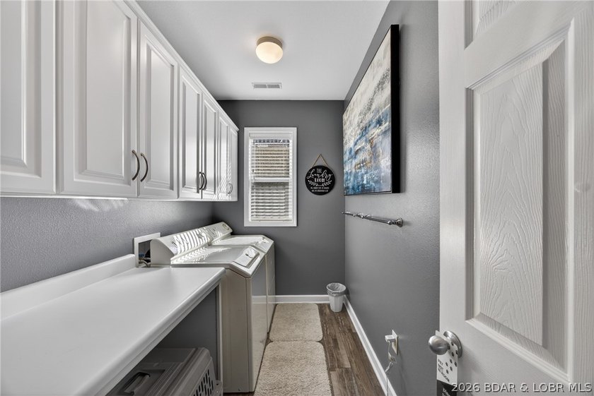Step inside to discover a bright, airy layout designed for - photo 32