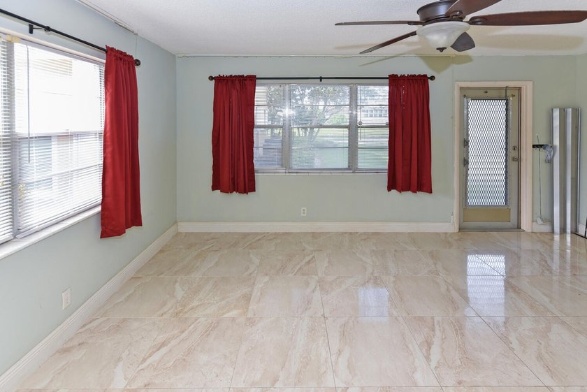 Step into this beautifully bright and spacious first-floor - photo 11