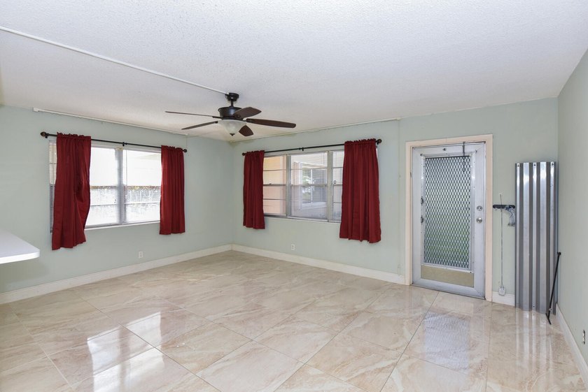 Step into this beautifully bright and spacious first-floor - photo 12