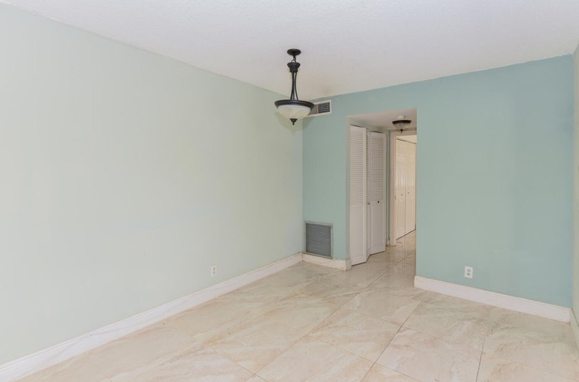 Step into this beautifully bright and spacious first-floor - photo 16