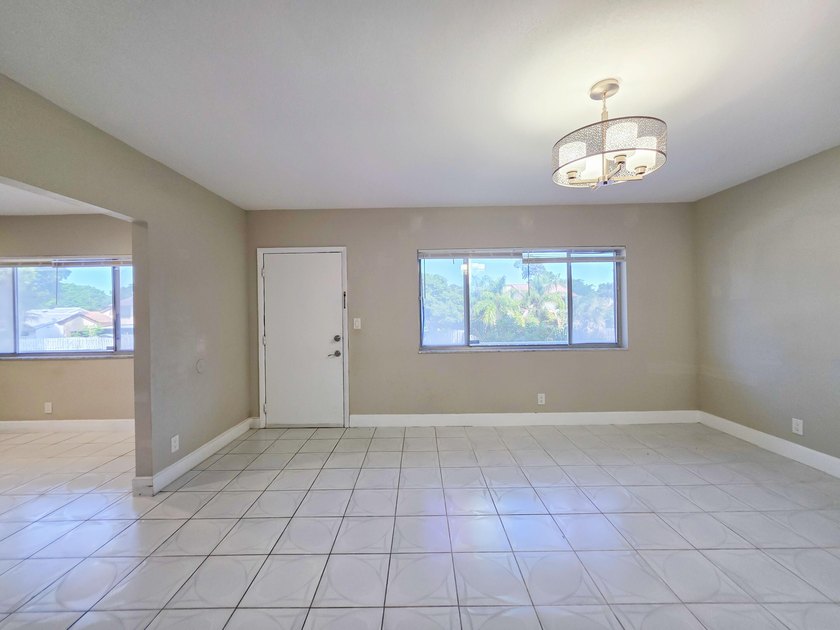Welcome to this thoughtfully designed three-bedroom - photo 11