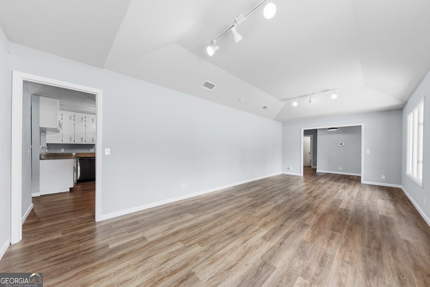 Plenty of space welcomes you in this 4/5 bedroom 2.5 bath home - photo 9