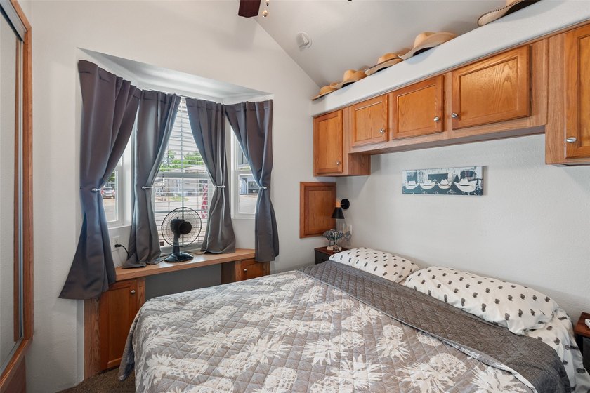 Enjoy waterfront living in this charming home situated on a - photo 22