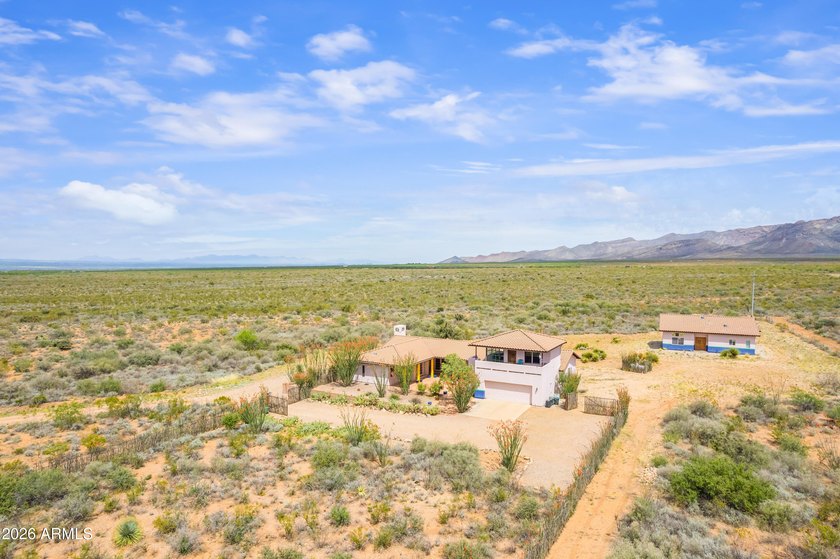 Tucked away in a serene and private setting on the outskirts of - photo 12