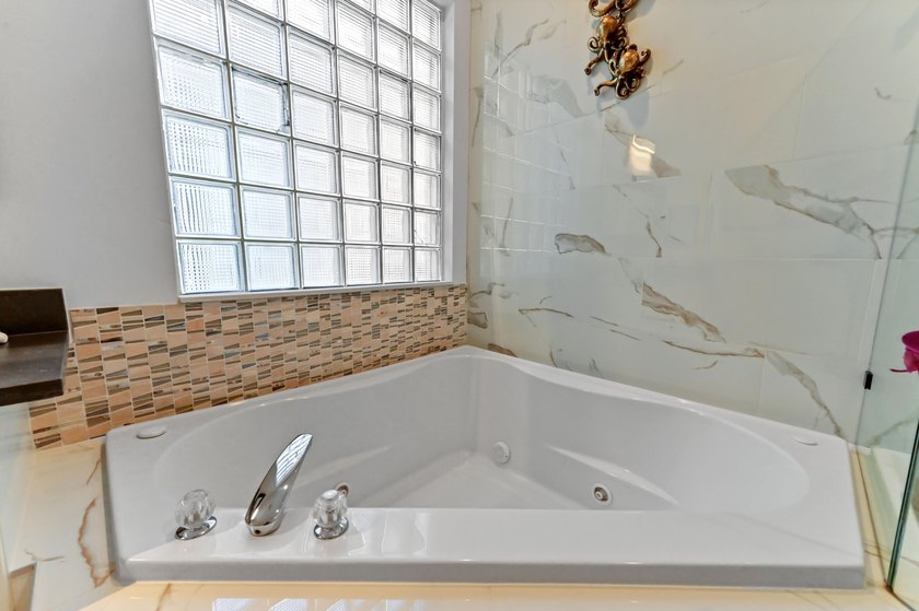Welcome to this beautiful 1-story home in the gated community of - photo 19
